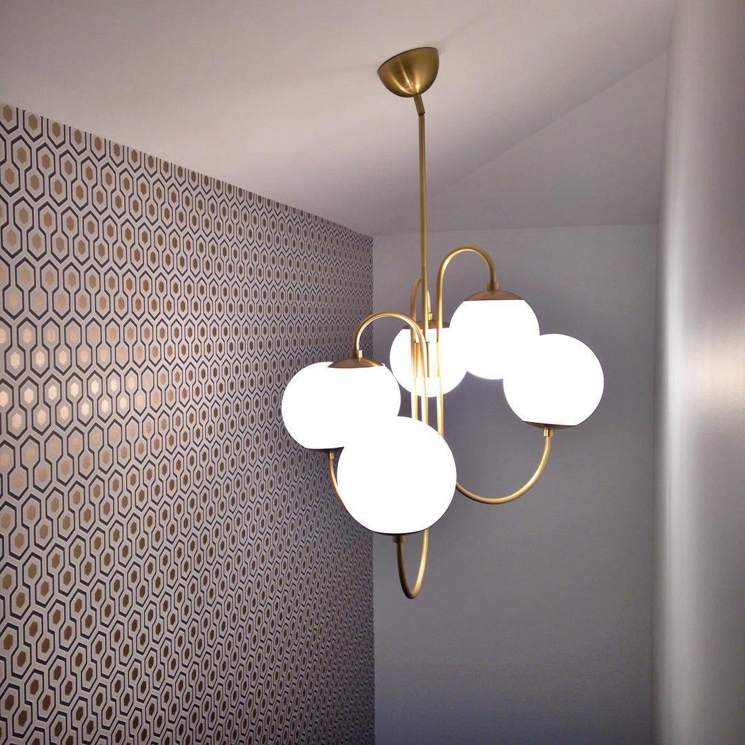 Gooseneck Chandelier warm light ambience Dubai villa