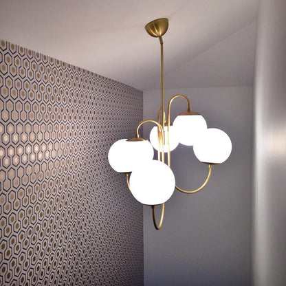 Gooseneck Chandelier warm light ambience Dubai villa