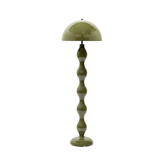 Drop sculptural color floor lamp in a modern interior