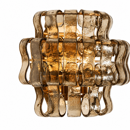 Mid-century amber glass wall sconce with brass detail
