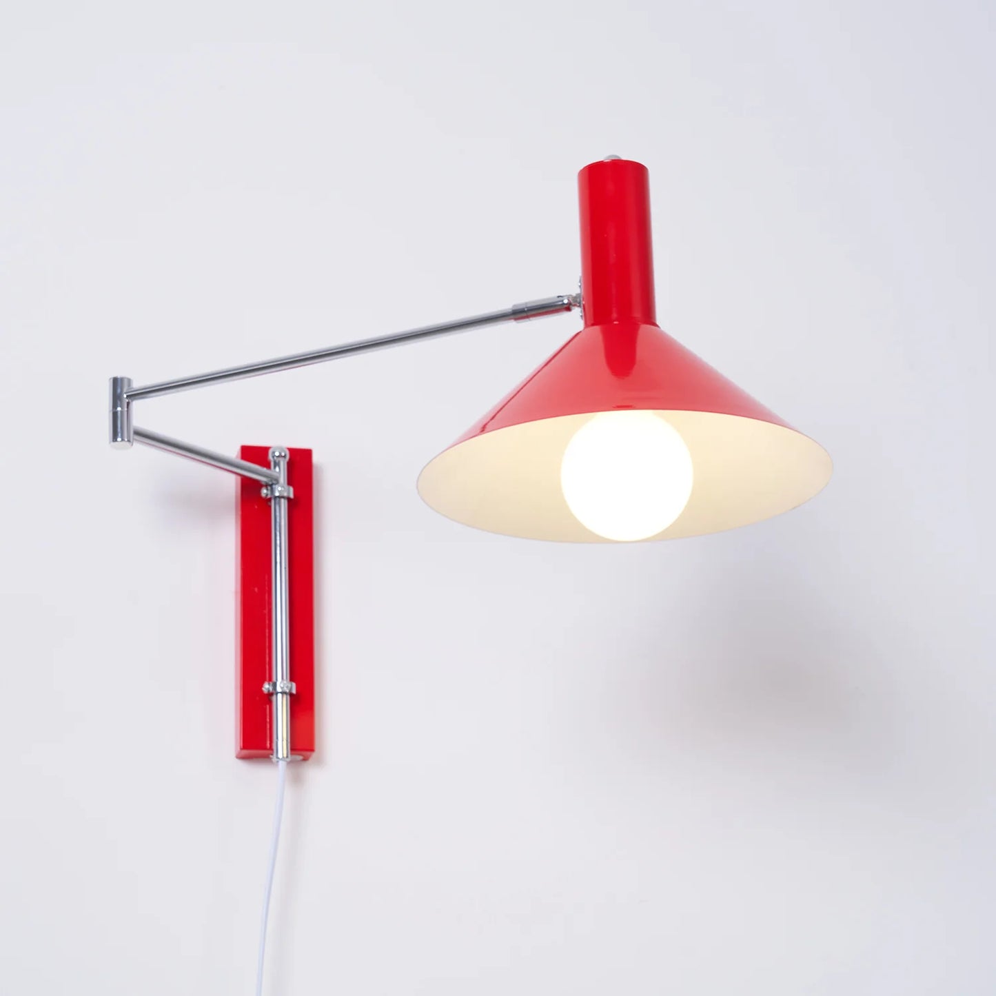 Anvia Adjustable Plug-In Wall Lamp