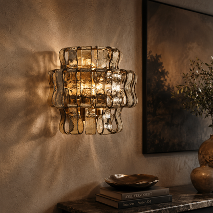 Amber glass bedside wall sconce illuminated