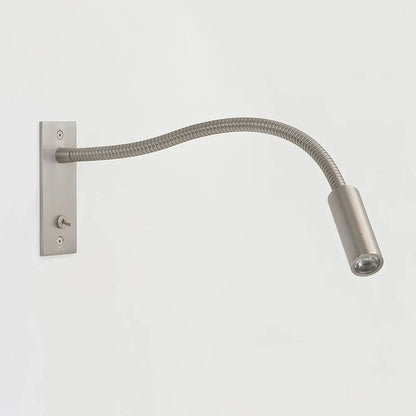 Sand nickel Art Deco wall light with warm illumination