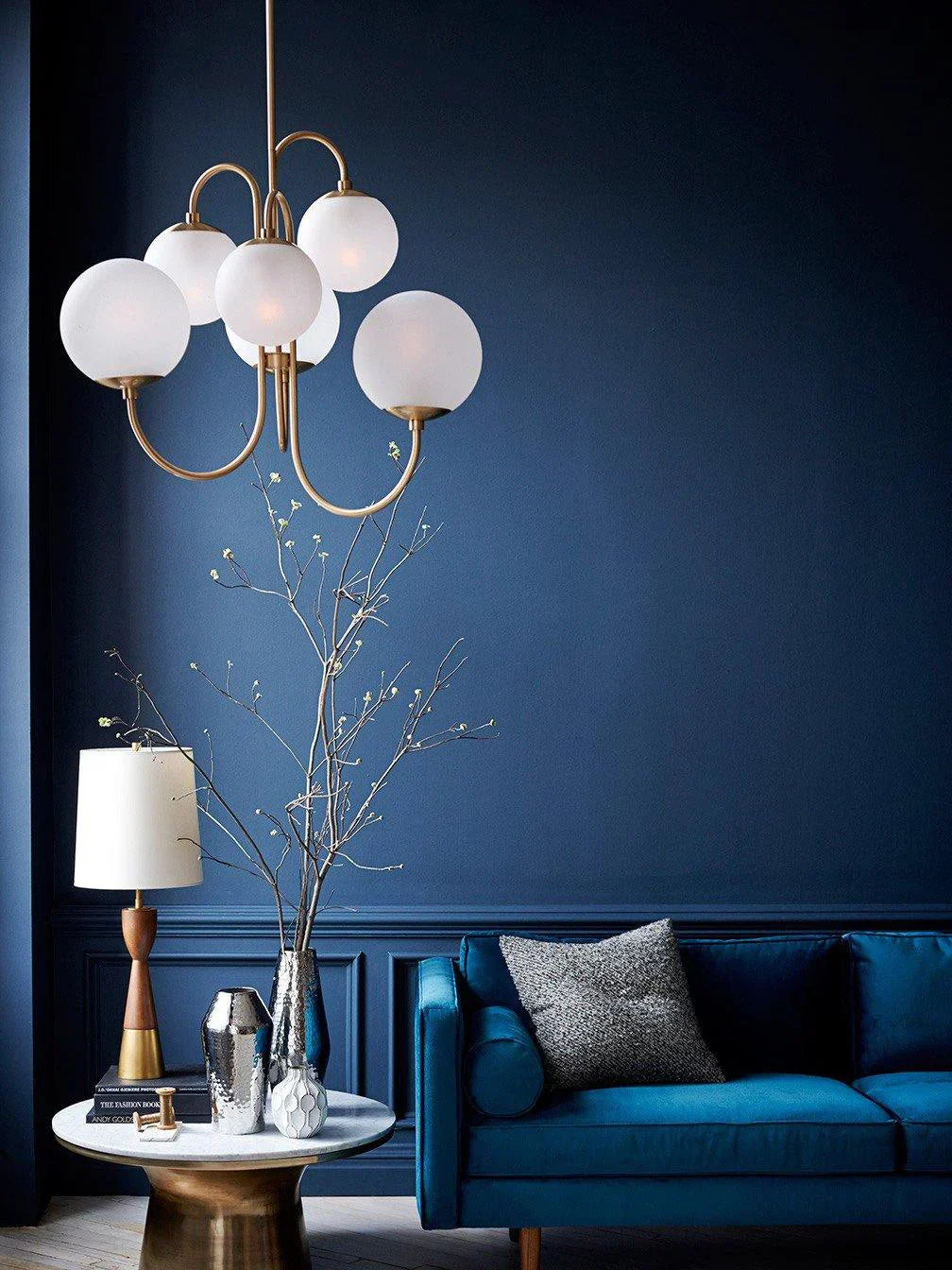 Gooseneck Chandelier hanging over UAE dining table