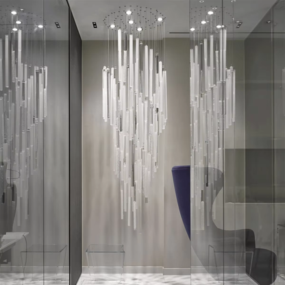 Diamond Cloud custom crystal chandelier installed in a glass room with hanging rods