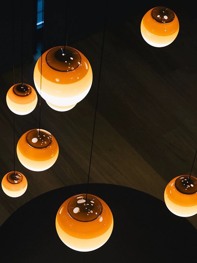 Dipping Light amber glass globe pendant close-up